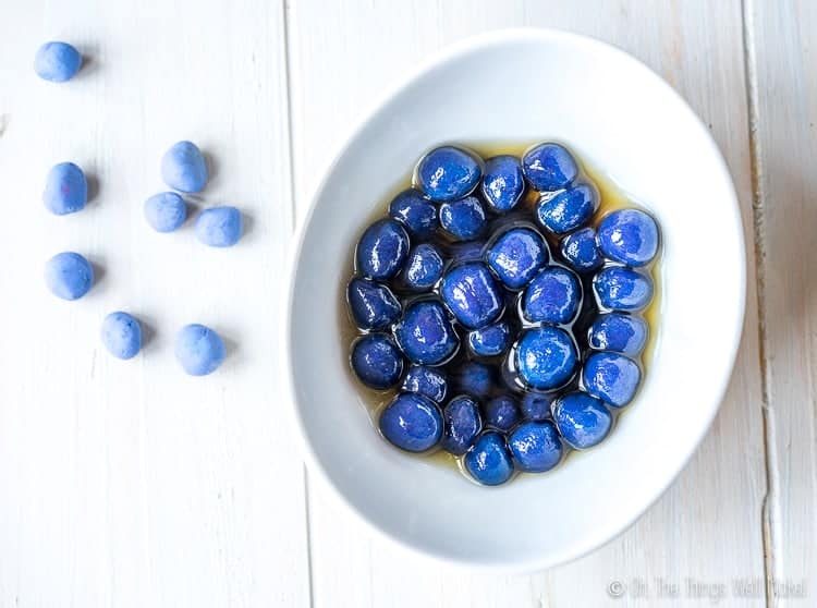 Overhead view of homemade blue boba in a white bowl