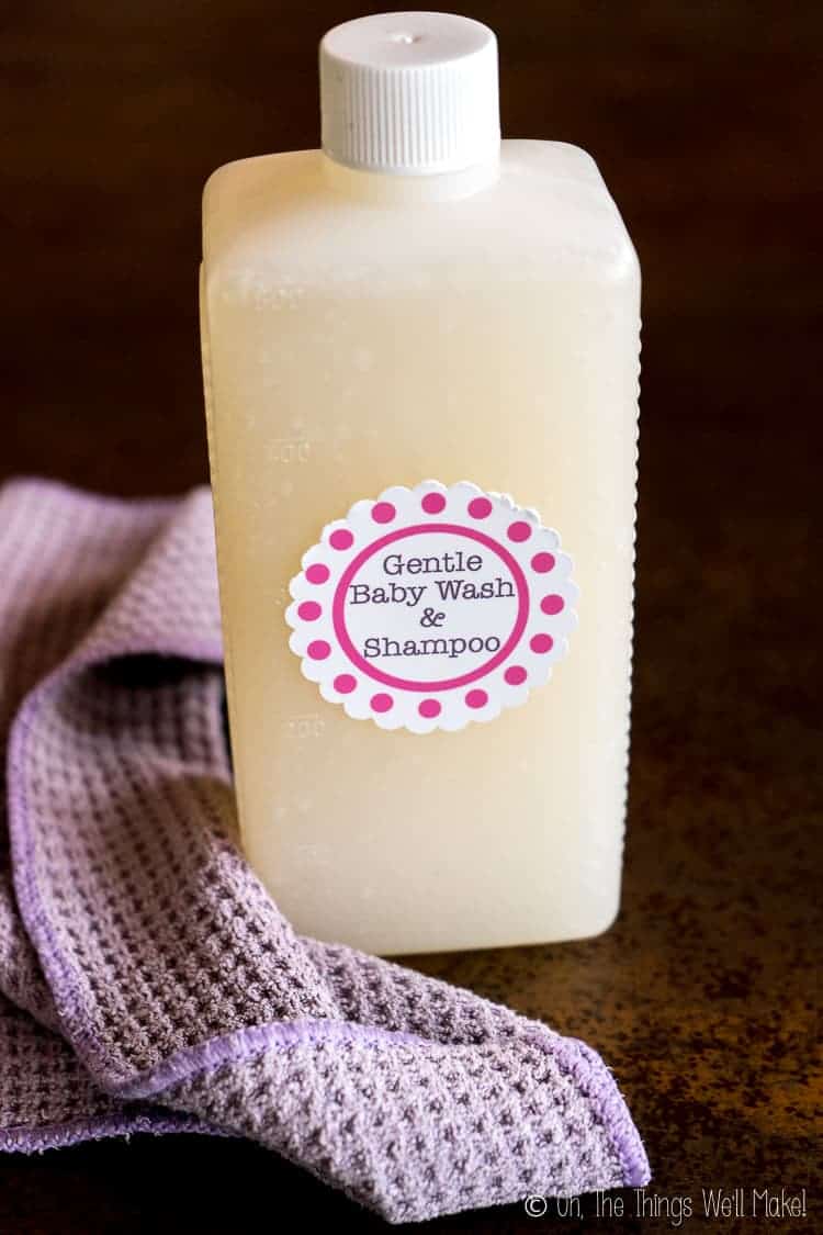 Homemade baby wash and shampoo in a plastic bottle with label.