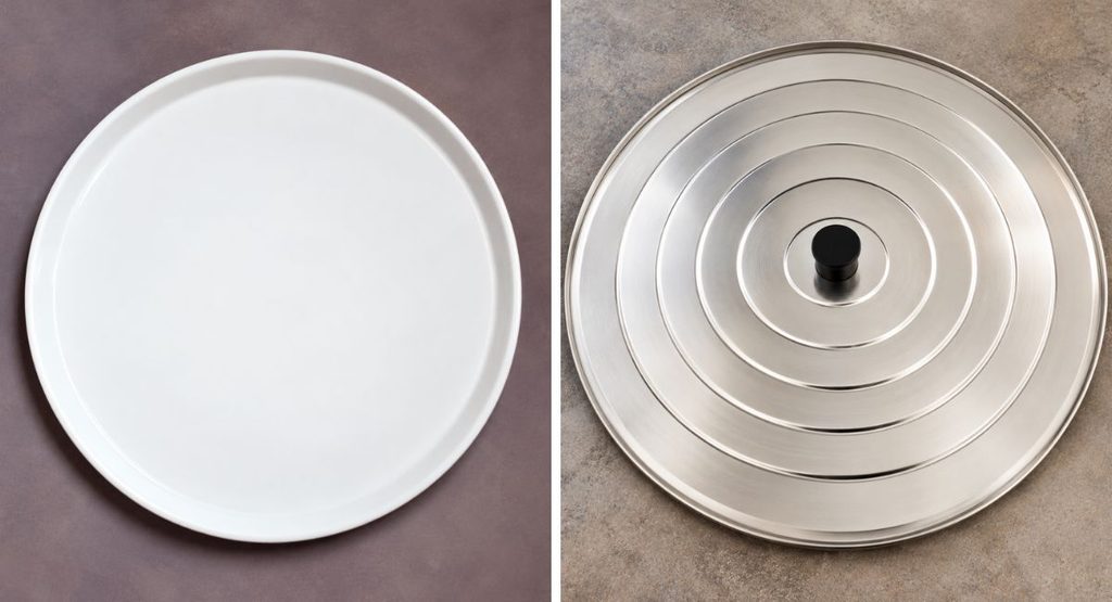 A white circular plate next to a stainless steel pot lid with a black handle, used to make a Captain America shield.