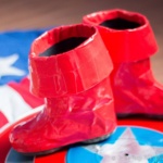 A pair of DIY superhero boots fashioned from red duct tape.