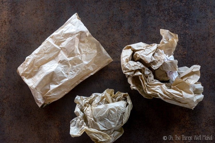 Paper bag next to scrap tissue paper