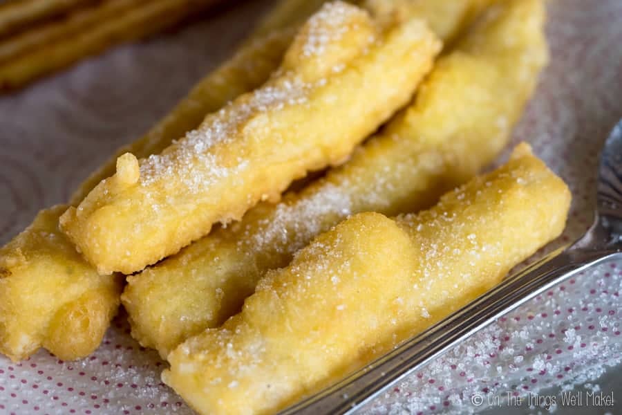 Fried grain-free churros with dough projections that formed when the dough bubbled out when fried. 