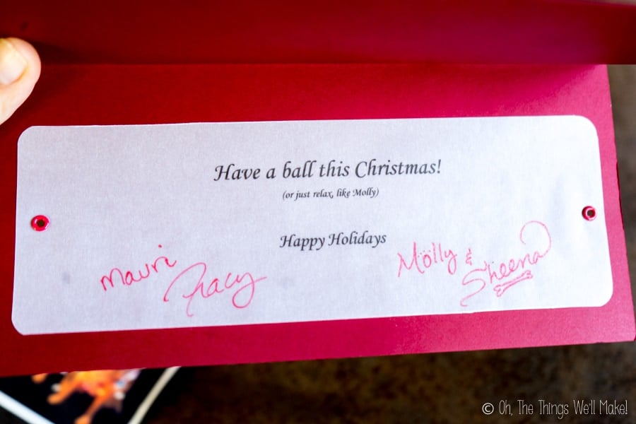 The inside of a Christmas card that sas "Have a ball this Christmas."