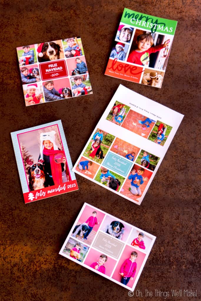 Various printed photo Christmas cards on display.