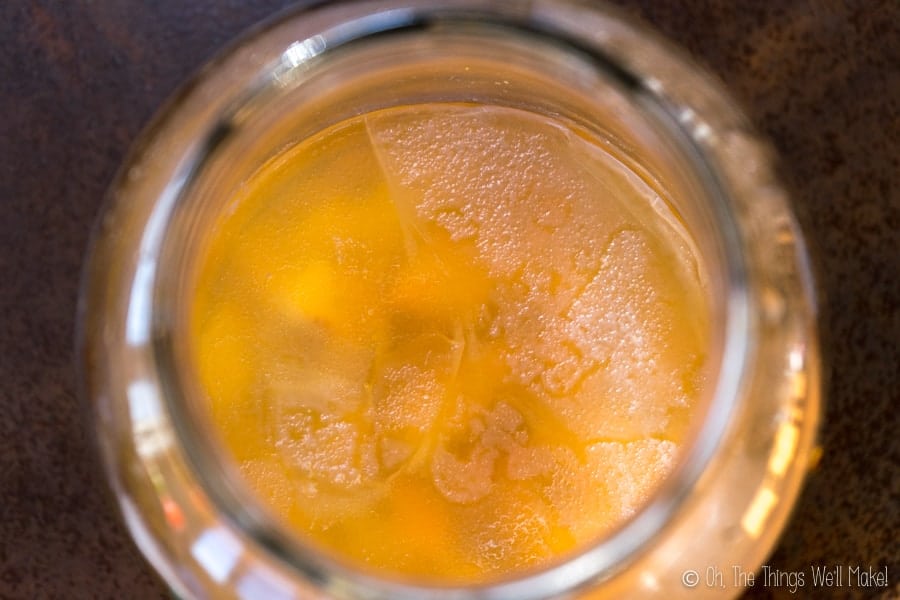 A mother forms on the surface of homemade apple cider vinegar