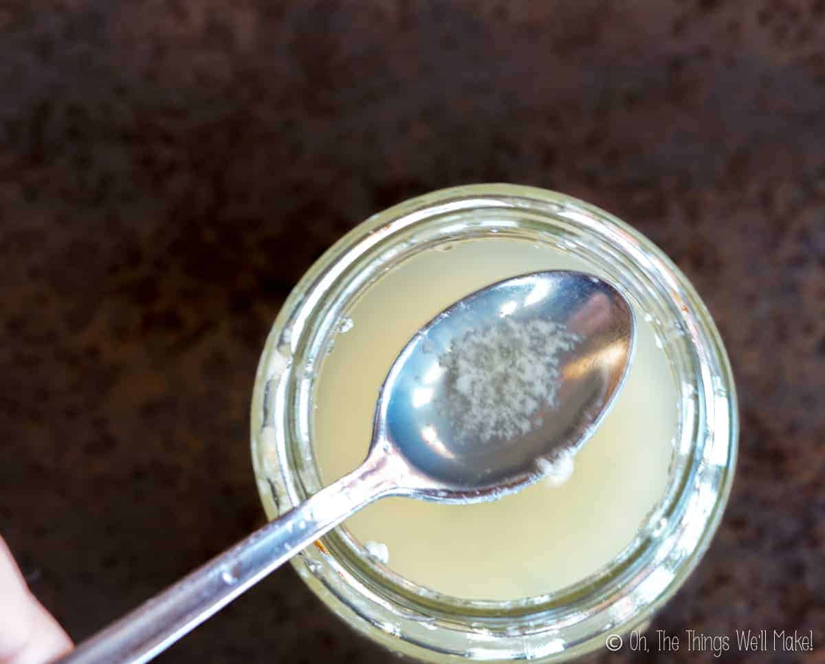 gummy mixture that has separated from liquid on a spoon