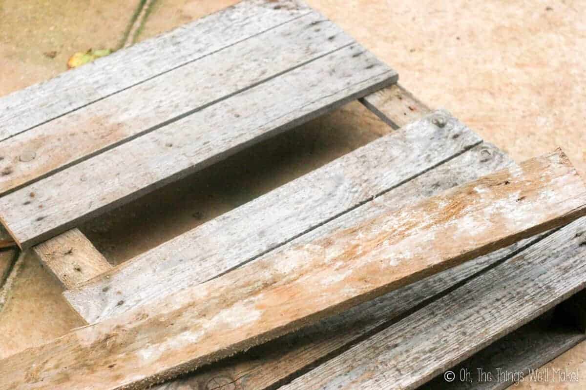 half a pallet with one plank removed and a new one over it. 