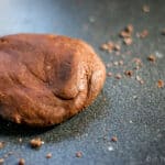 A ball of chocolate pasta dough