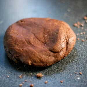 A ball of chocolate pasta dough