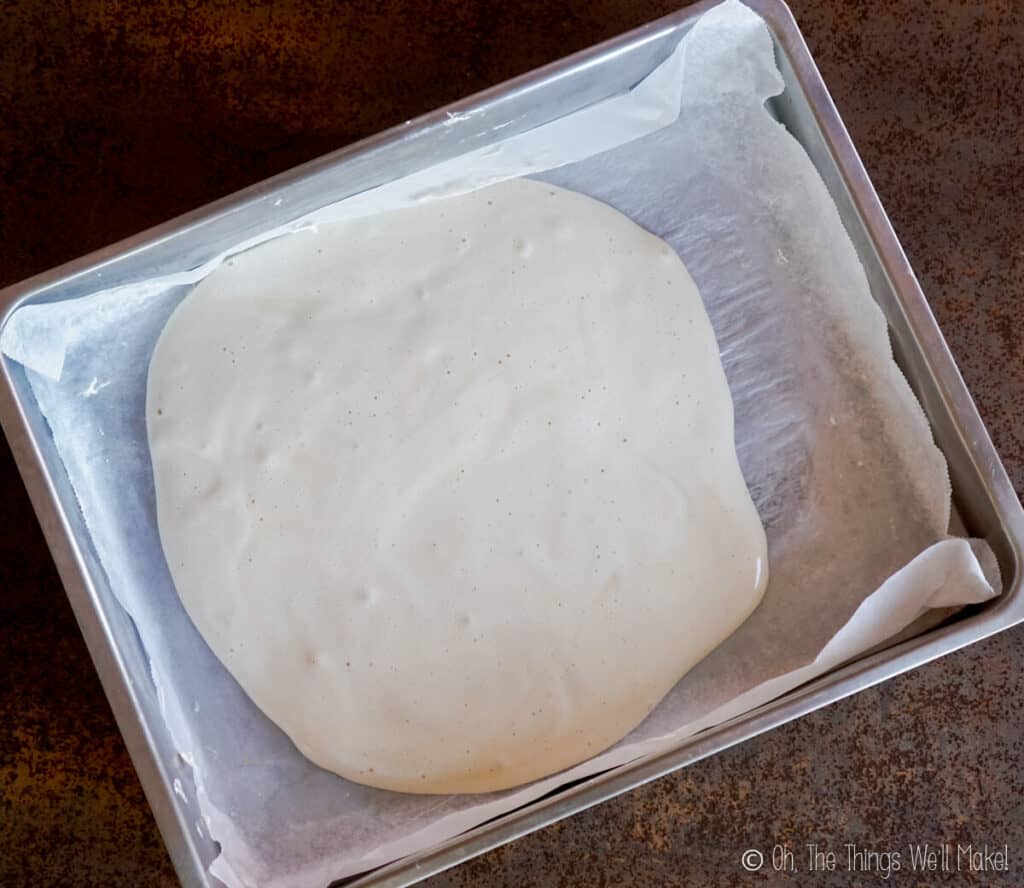 Marshmallow mixture on a baking tray. 