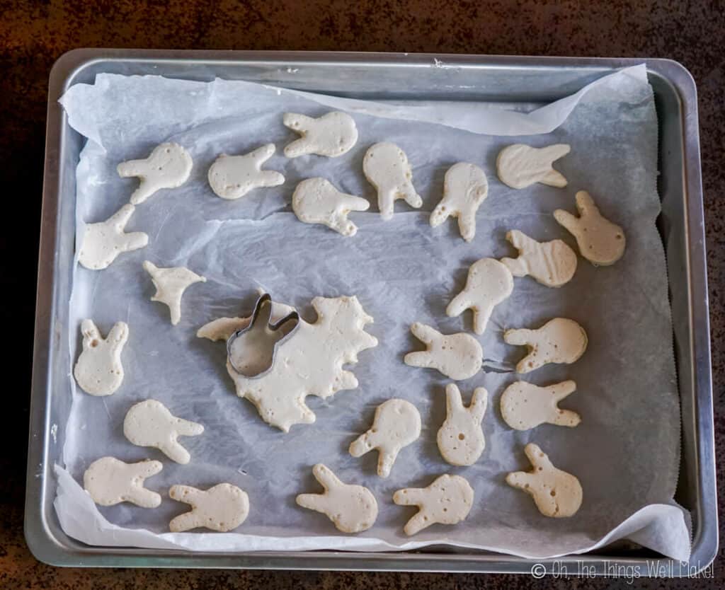 Many cut out marshmallow shapes in form of an Easter bunny.