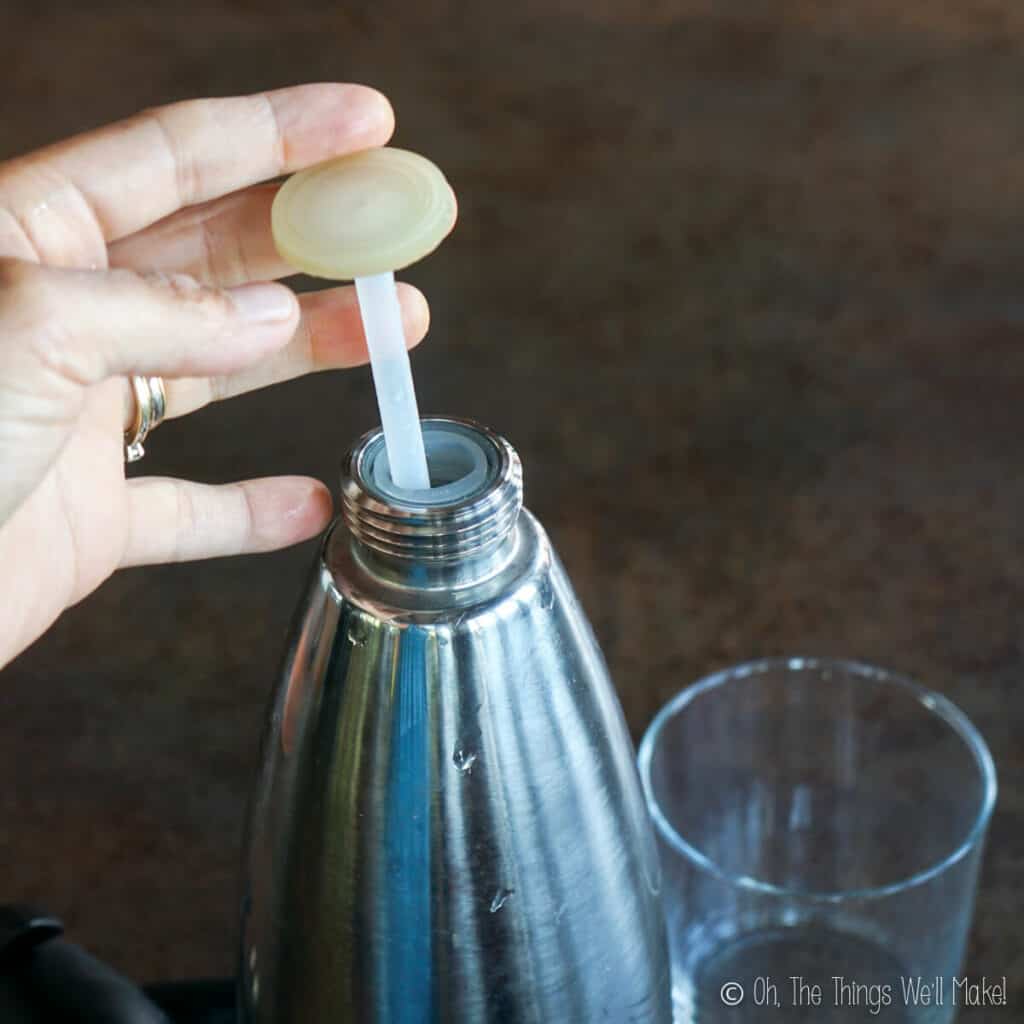 removing the tube from the center of a soda siphon