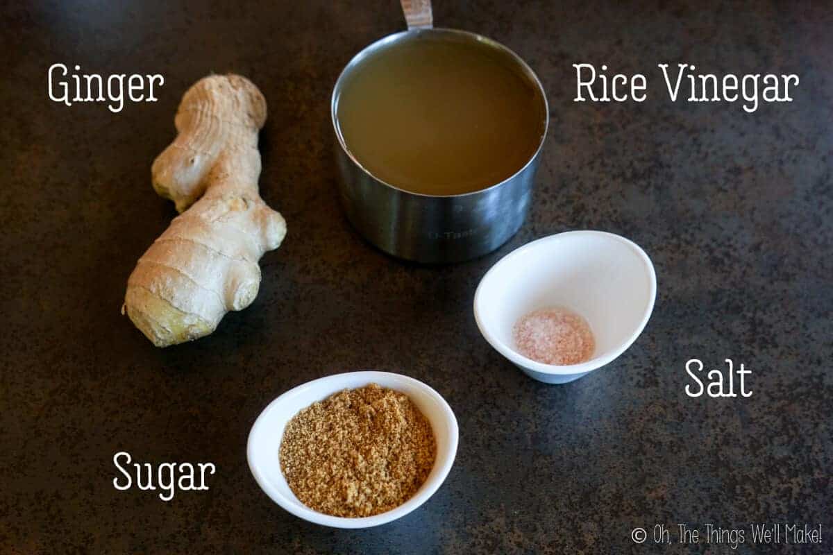 Overhead view of ingredients for pickled ginger for sushi: ginger, rice vinegar, salt, and sugar