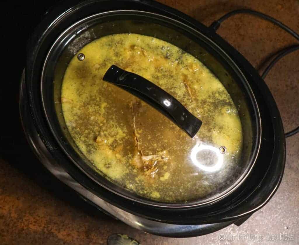 Overhead view of a slow cooker with the top on.