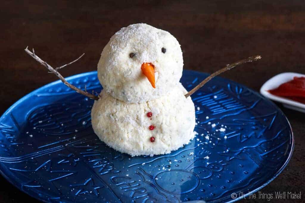 the snowman cheese ball as seen from the front without the "hat" and "scarf"