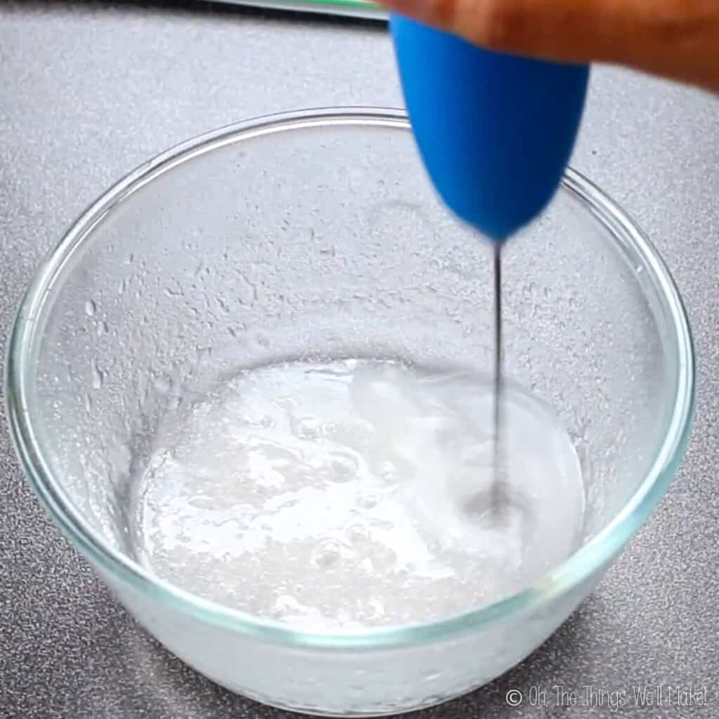blending the xanthan gum and water with a milk frother