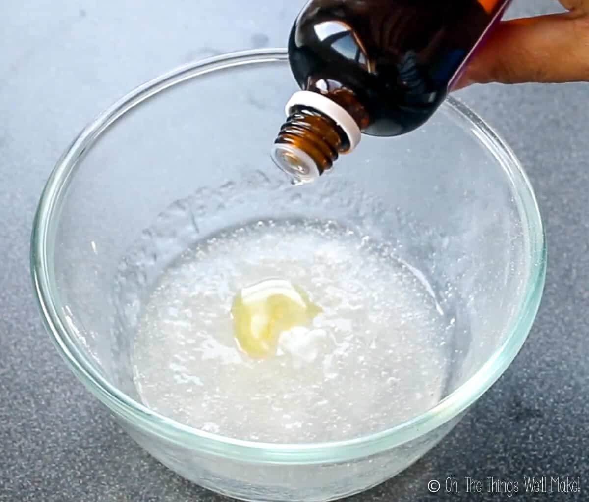 Adding drops of preservative into a homemade hair gel