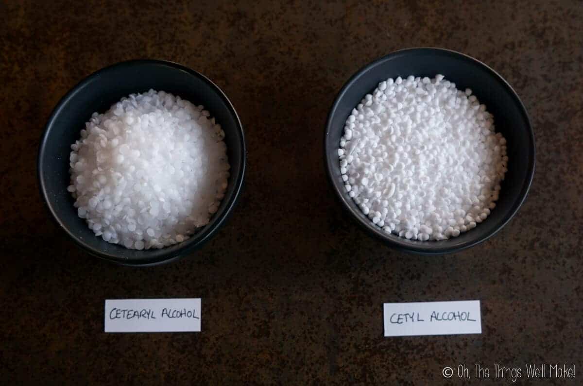 Overhead view of a bowl of Cetearyl alcohol next to a bowl of Cetyl alcohol
