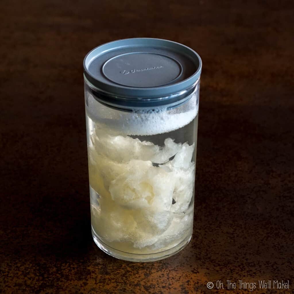 liuiqd soap paste in a glass jar with water.