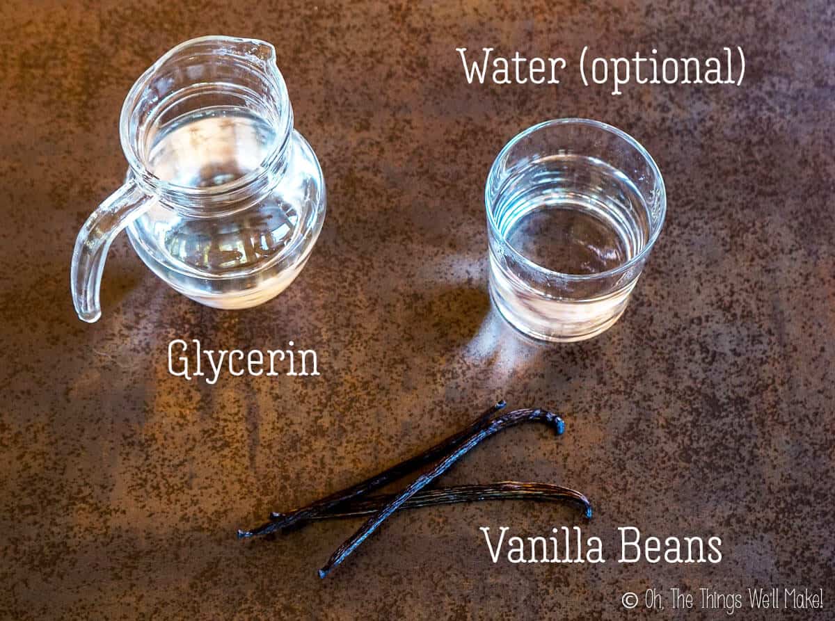 overhead view of glycerin, water, and vanilla beans