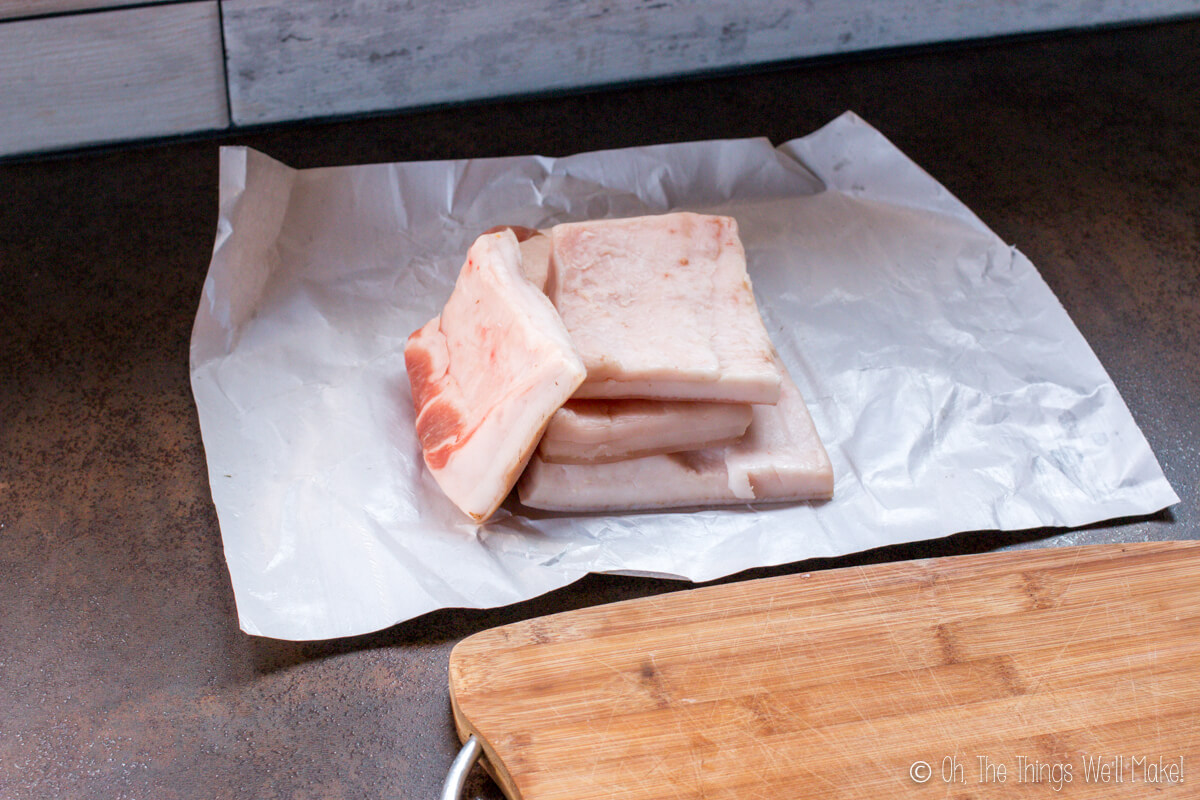 4 pieces of pork fatback on butcher paper