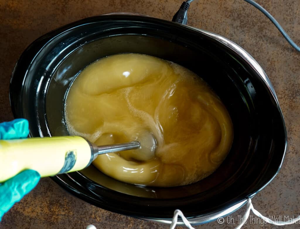 Overhead view of blending the soap, even thicker and more opaque