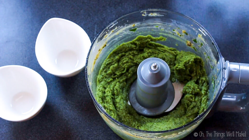 overhead view of green ice cream in a food processor bowl