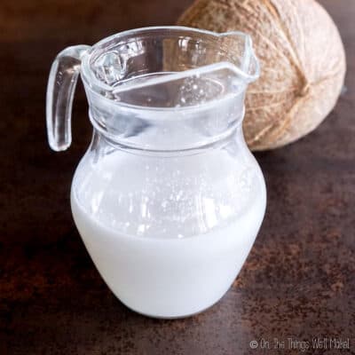 A pitcher filled with homemade coconut milk