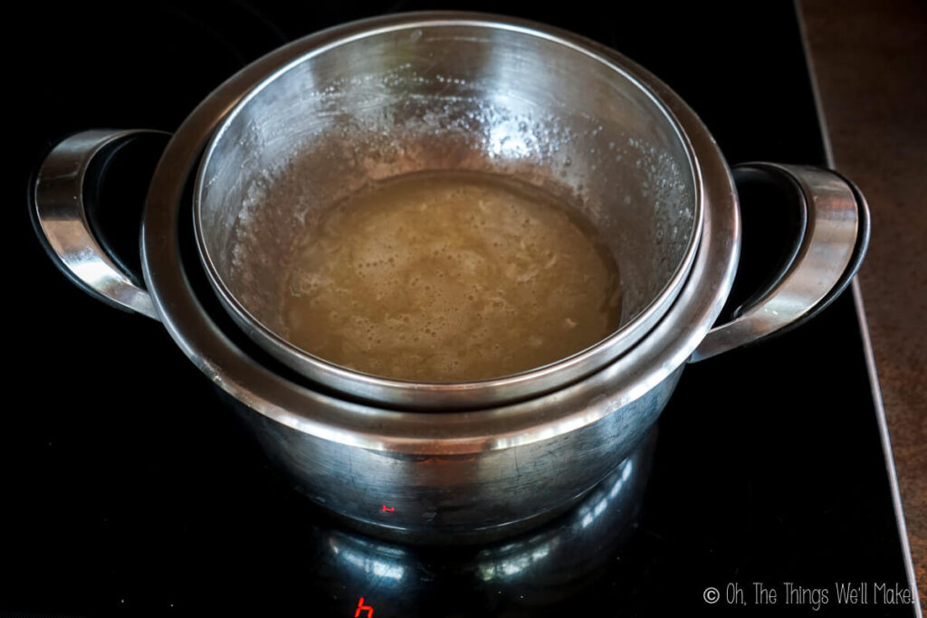 egg whites and sugar in a double boiler