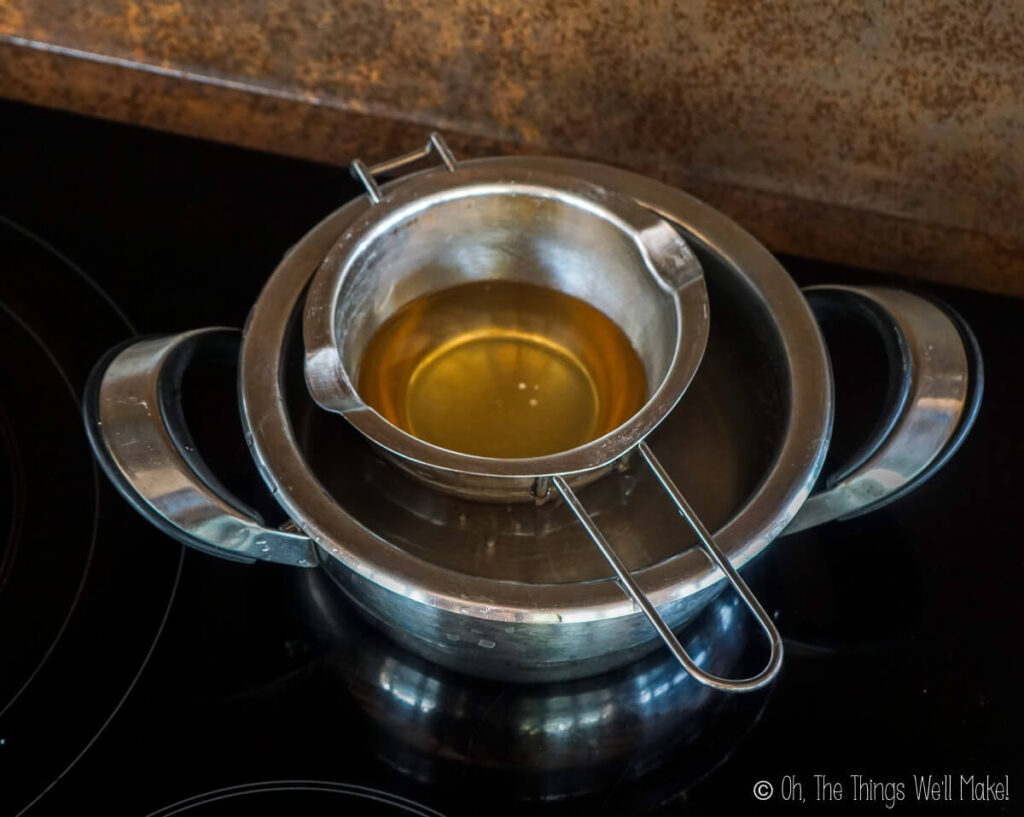 Oils and melted emulsifying wax in a double boiler 