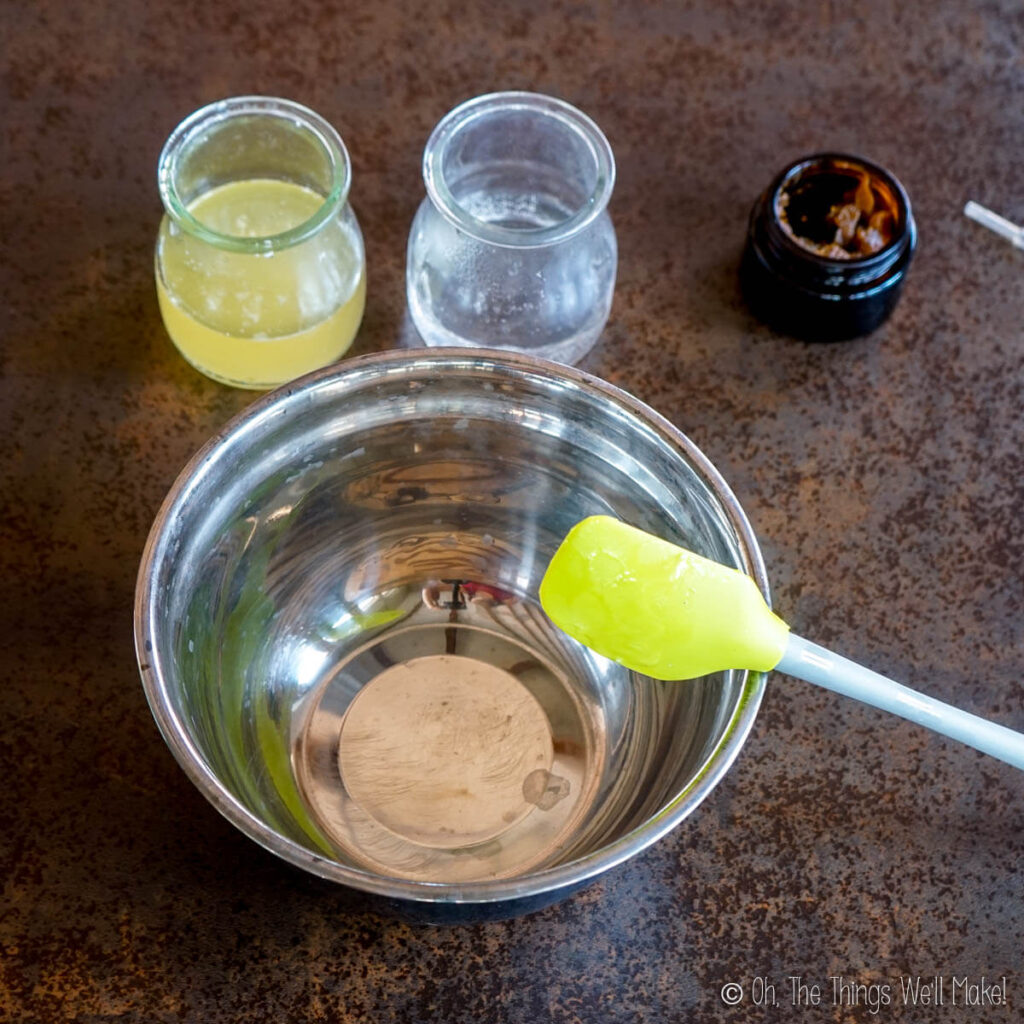 jars with heated water and oil phases next to an empty bowl
