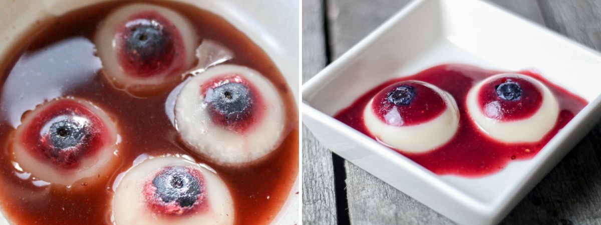 Two early versions of homemade gummy eyeballs served in red fruit sauce. The first has exposed blueberry pupils, while the second has larger red gelatin irises.