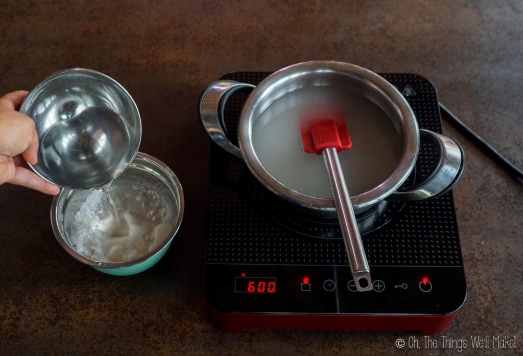 mixing water and cornstarch in a bowl next to a pot with a sugar syrup