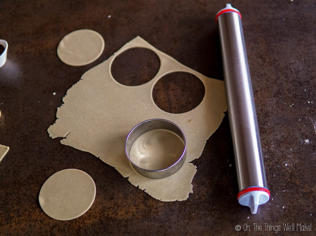 Cutting disks of papadum dough 