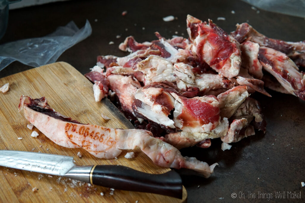 cutting off skin and meat from beef suet