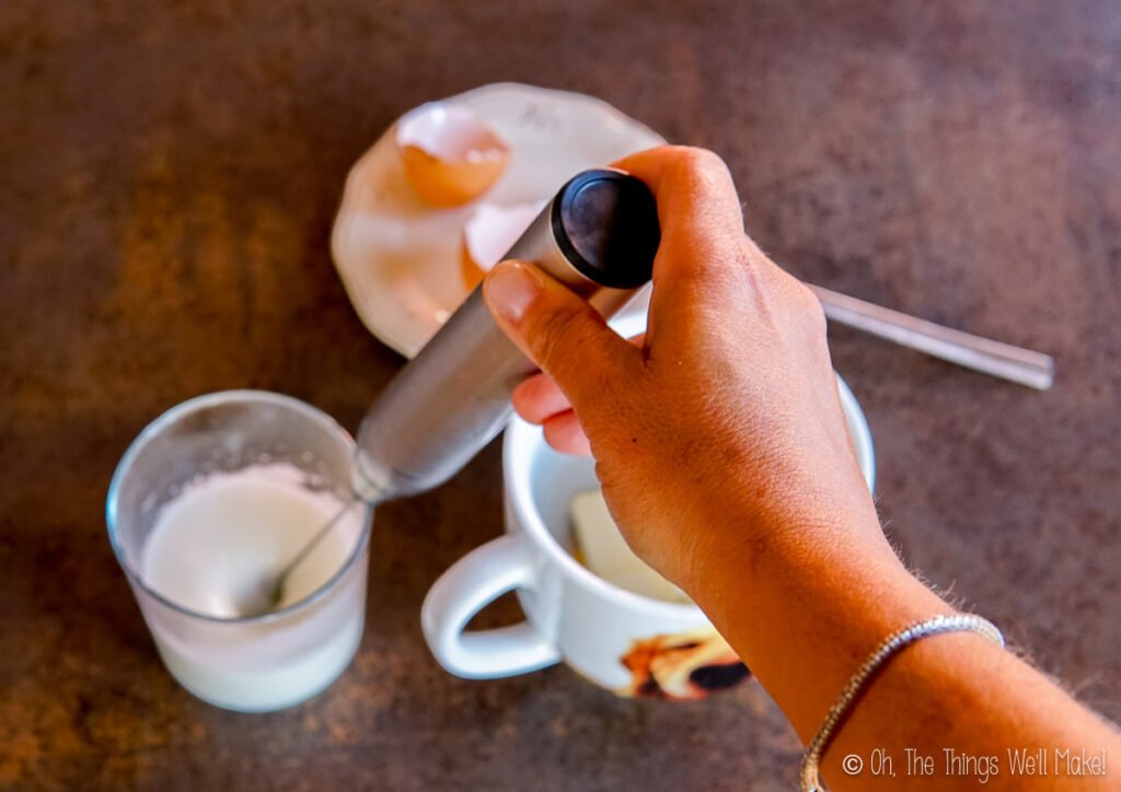 mixing egg whites with a milk frother.
