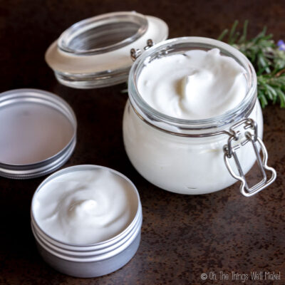 Overhead view of two containers filled with a whipped tallow balm