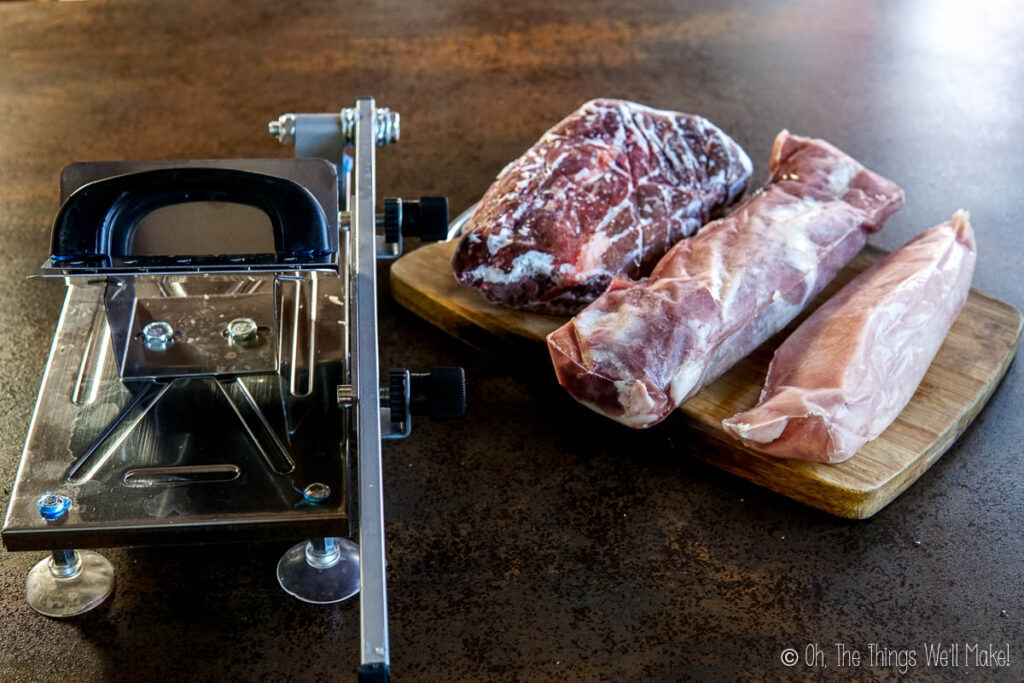 Frozen meat slicer by 3 frozen meat pieces