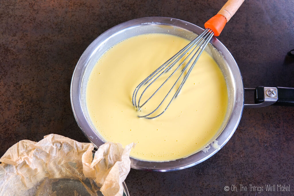 whisking together the ingredients in a pan