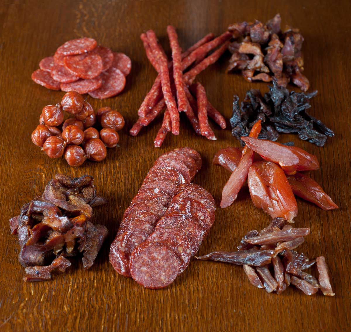 a variety of cured sausages