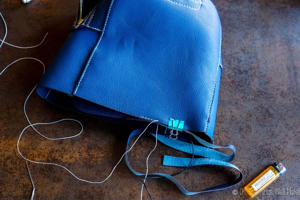 sewing the bottom onto the backapck